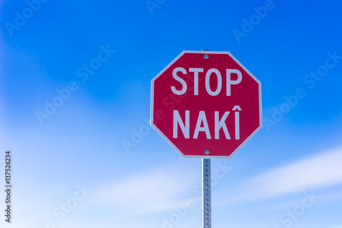 Bilingual road stop sign