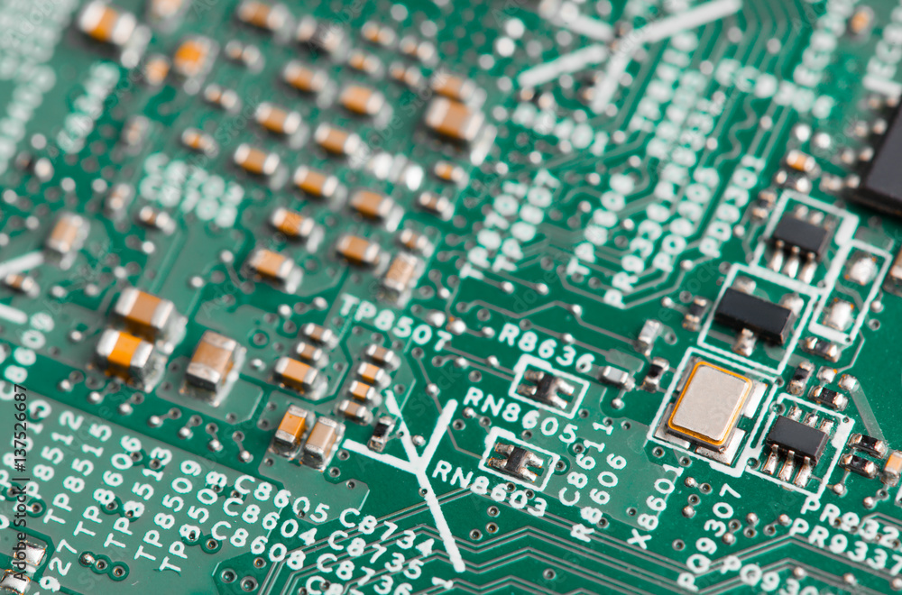Close up of electronic components on the motherboard, microprocessor chip Close up of electronic components on the motherboard, microprocessor chip