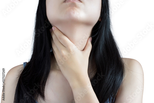 Acute pain and sore throat symptom in a woman isolated on white background. Clipping path on white background.