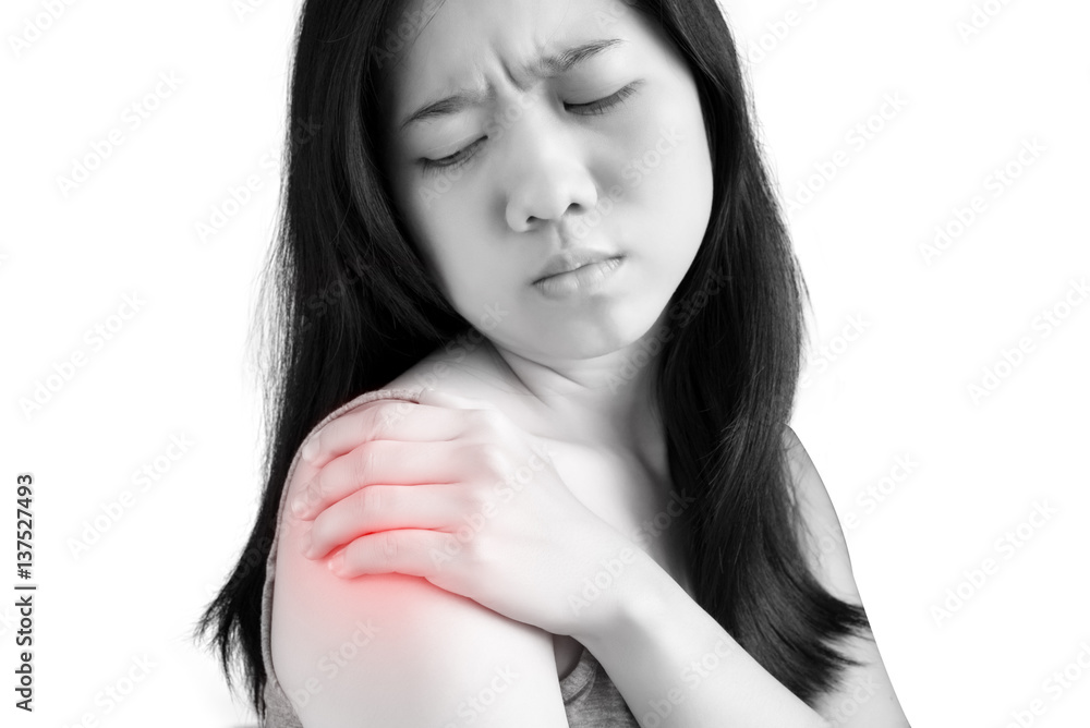 Painful shoulder in a woman isolated on white background. Clipping path on white background. Painful shoulder in a woman isolated on white background. Clipping path on white background.