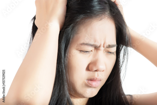 Headache symptom in a woman isolated on white background. Clipping path on white background.