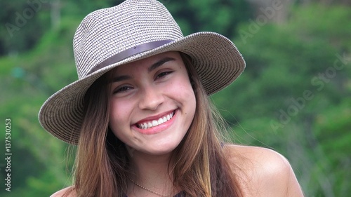 Smiling Teen Girl Wearing Hat © dtiberio