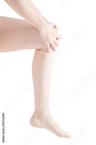 Acute pain in a woman knee isolated on white background. Clipping path on white background. © chatchai