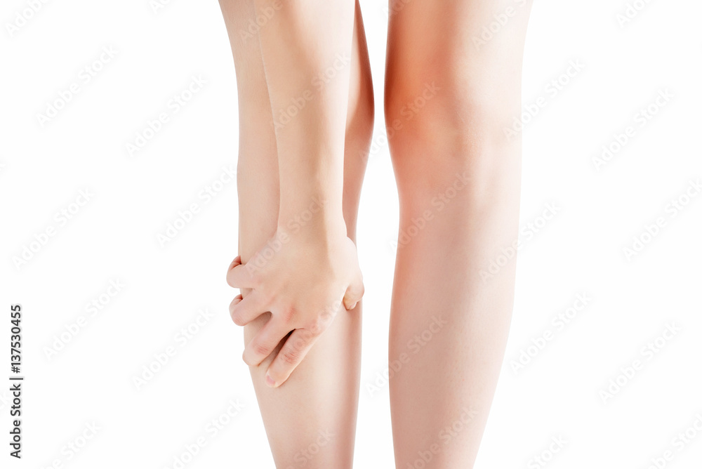 Acute pain in a woman shin isolated on white background. Clipping path on white background. Acute pain in a woman shin isolated on white background. Clipping path on white background.