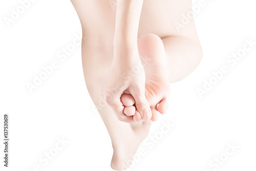 Acute pain in a woman feet isolated on white background. Clipping path on white background. © chatchai