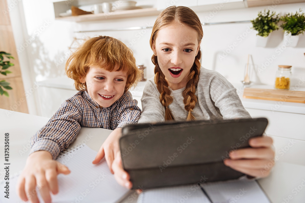 Excited funny children taking a selfie Excited funny children taking a selfie