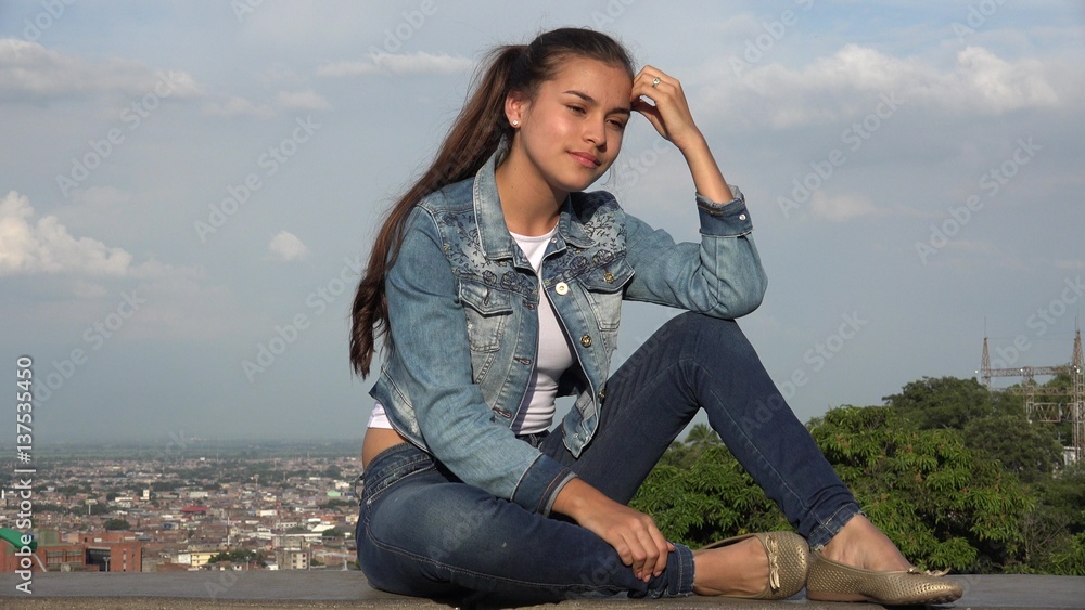 Teen Girl Sitting And Thinking Or Daydreaming Teen Girl Sitting And Thinking Or Daydreaming