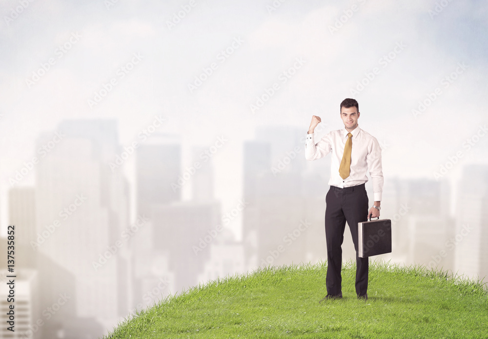 man standing in front of city landscape man standing in front of city landscape