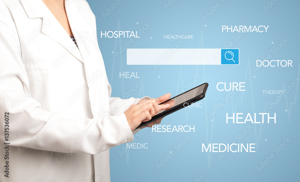 Female doctor with tablet Female doctor with tablet