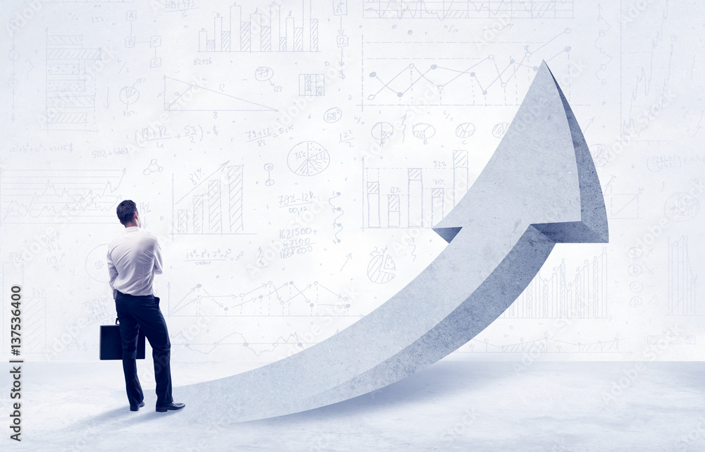 Obraz premium Financial businessman with arrow concept