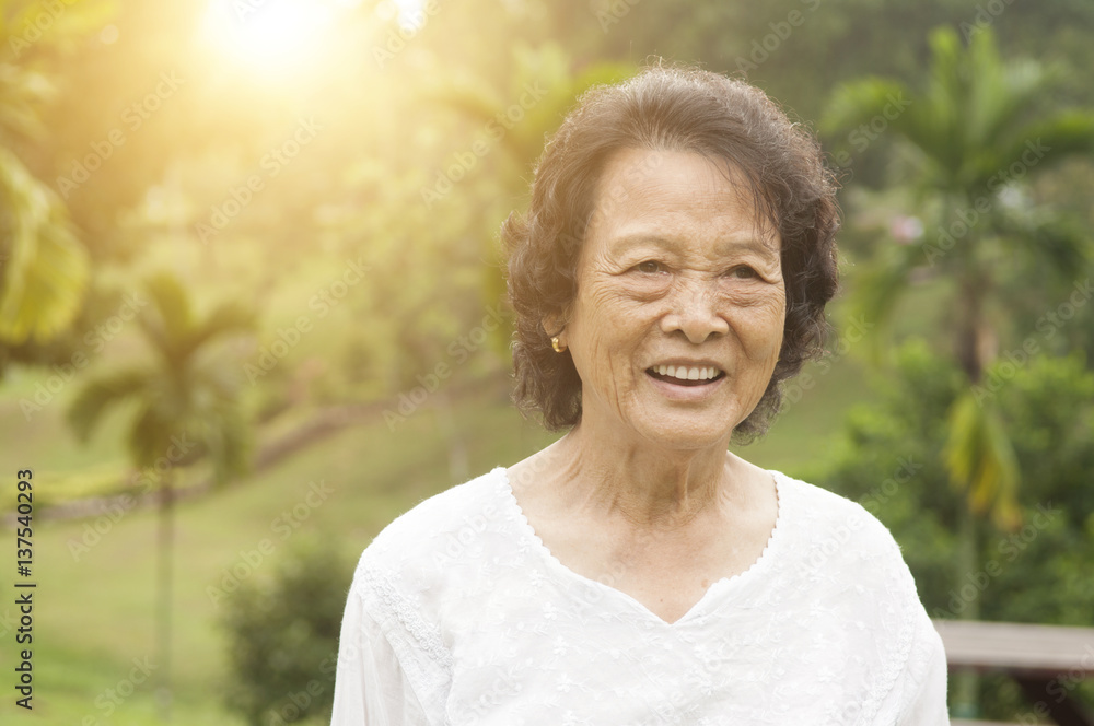 Happy Asian seniors woman laughing at outdoor Happy Asian seniors woman laughing at outdoor
