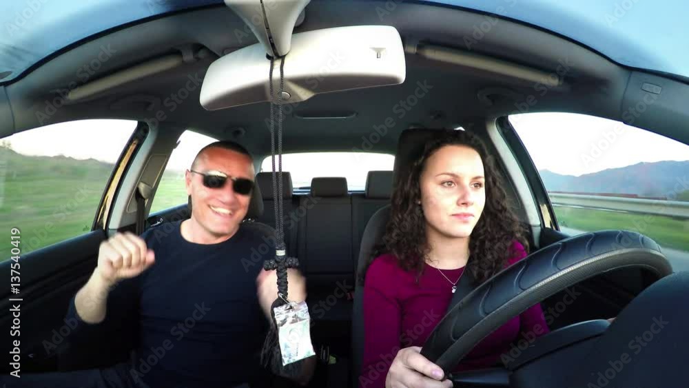 father dancing while daughter driving father dancing while daughter driving