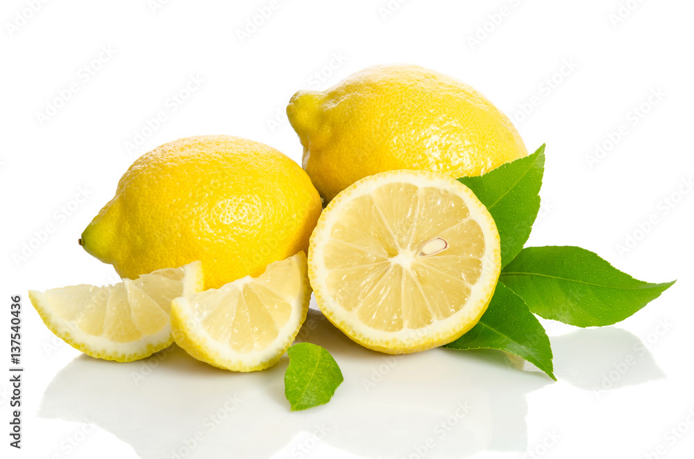Two lemons and half with leaves isolated on white background Two lemons and half with leaves isolated on white background