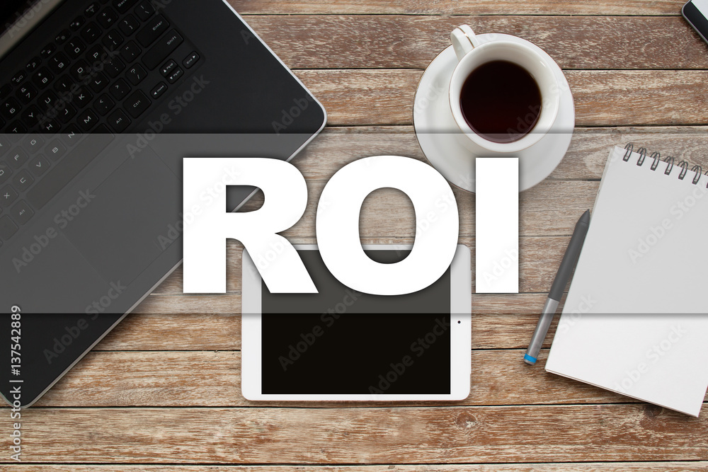 Tablet on desktop with roi text. Tablet on desktop with roi text.