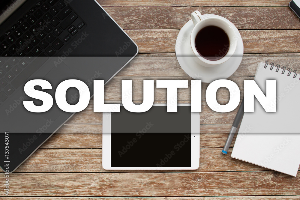 Tablet on desktop with solution text. Tablet on desktop with solution text.