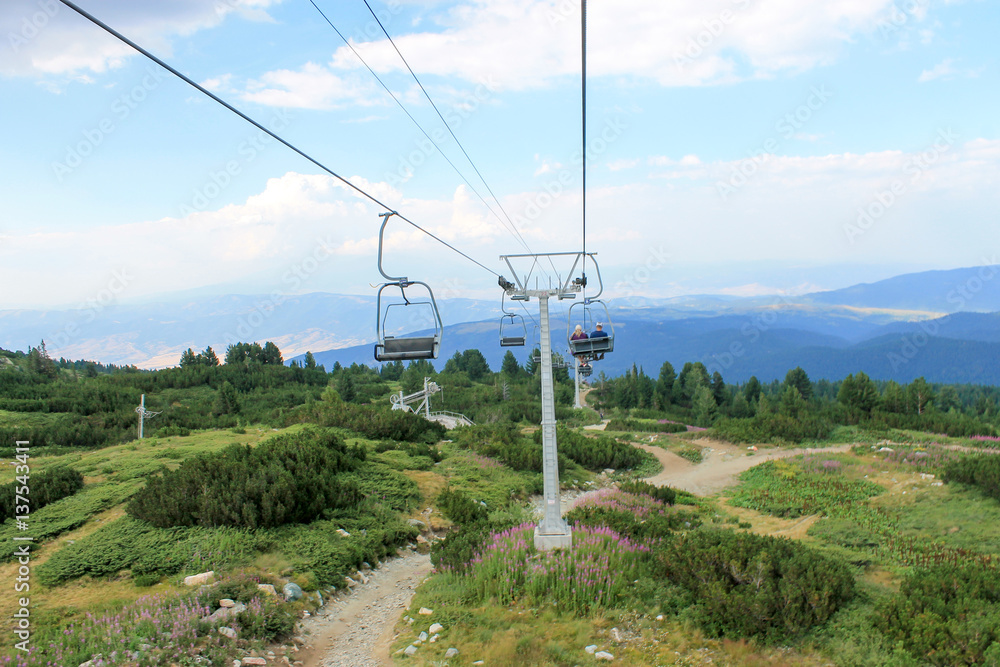 Rila lakes, Bulgaria - August 07 2016 : People going down with lift after the tiring walking in the mountain