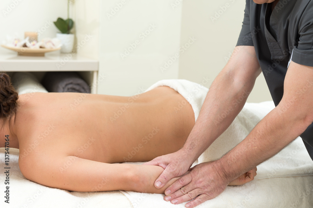 Fototapeta premium Massage on a woman at spa salon