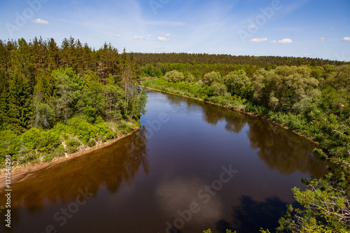 Fototapeta Naklejka Na Ścianę i Meble -  Panoramic view of river Gauja turn from path on the hill. Gauja National park, Latvia.