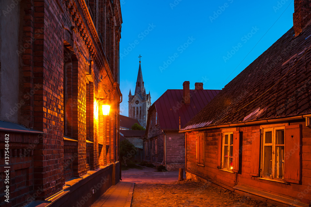 Old town street and buildings at summer night. Cesis, Latvia Old town street and buildings at summer night. Cesis, Latvia
