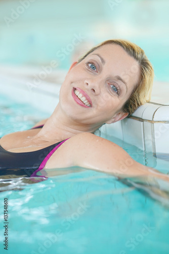 Blond woman relaxing in spa pool © goodluz
