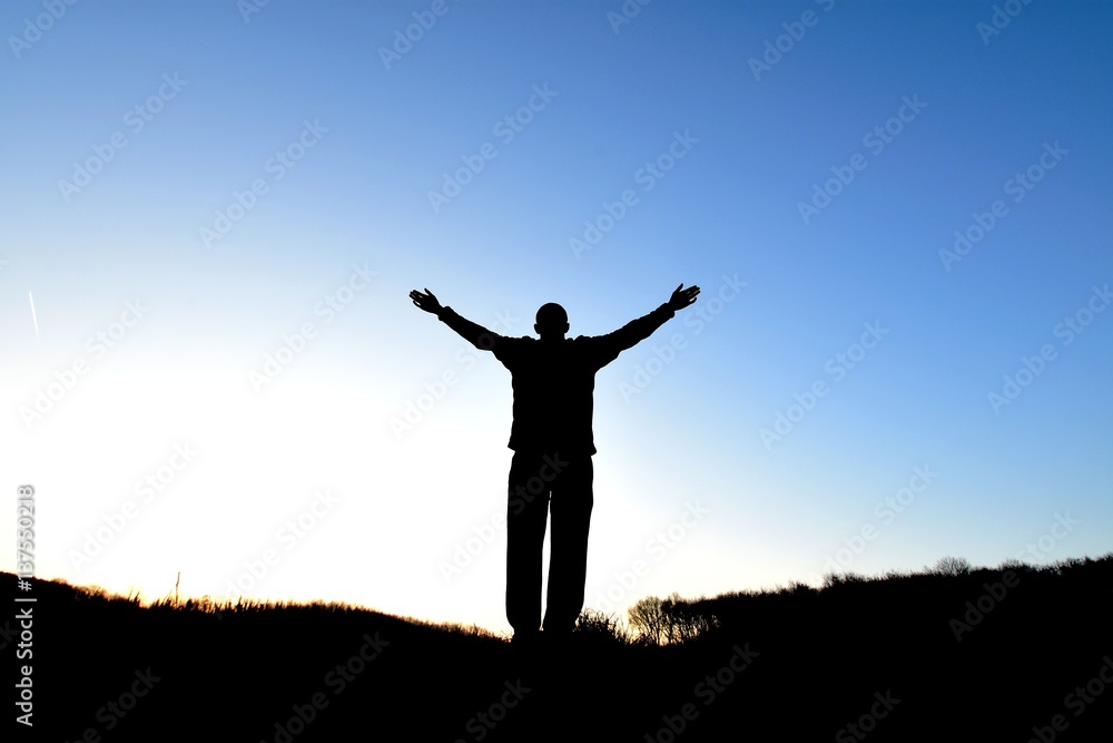 Man in silhouette in nature