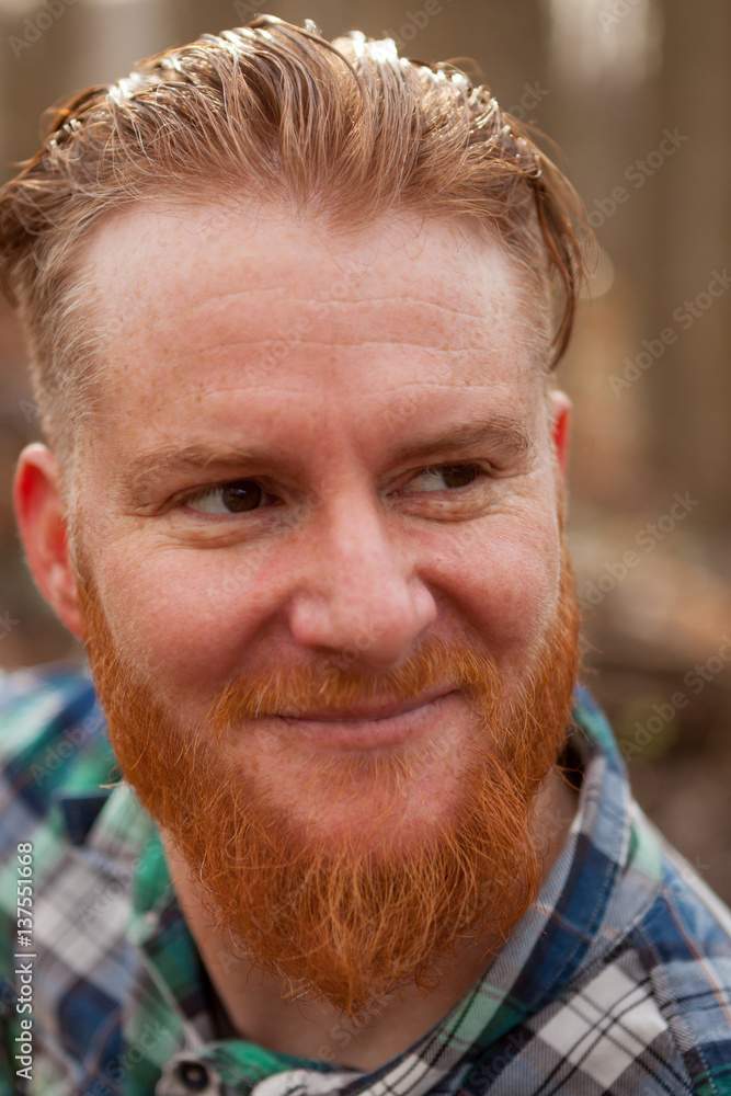 Portrait of red haired man with long beard Portrait of red haired man with long beard
