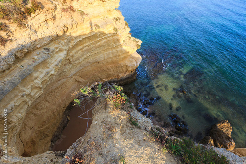 Atlantic rocky coast view (Algarve, Portugal).