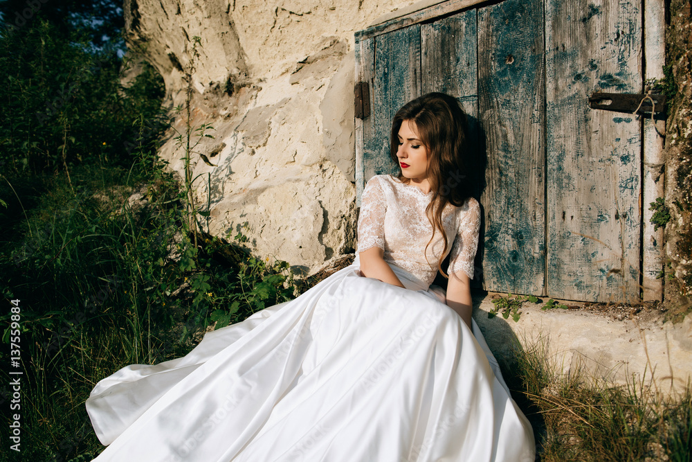 beautiful bride in mountain city. wedding day concept