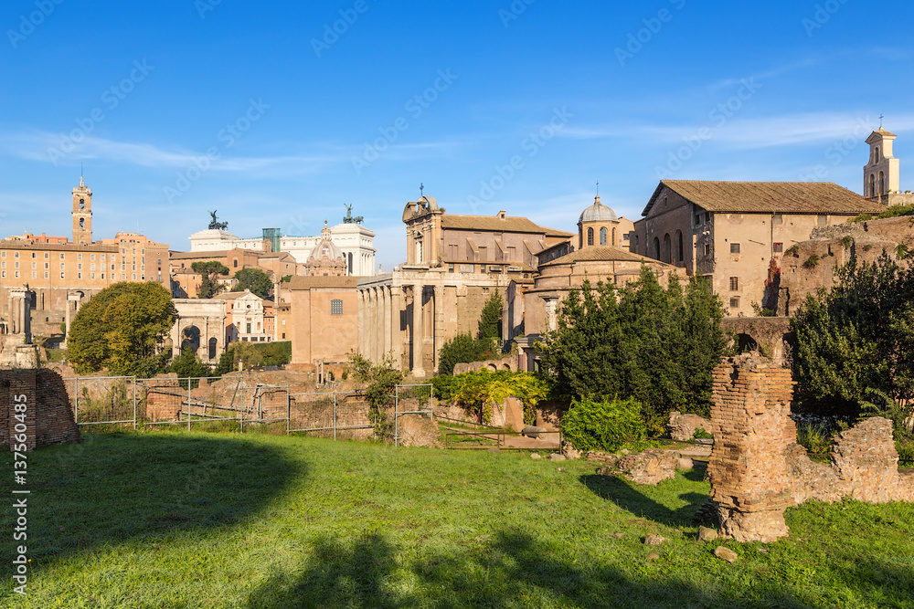 Rome, Italy. From left to right: the temple of Saturn, Tabularium (Senators Palace), Arch of Septimius Severus, Mamertinum, the Curia Julia, the Temple of Antoninus and Faustina, Temple of Romulus