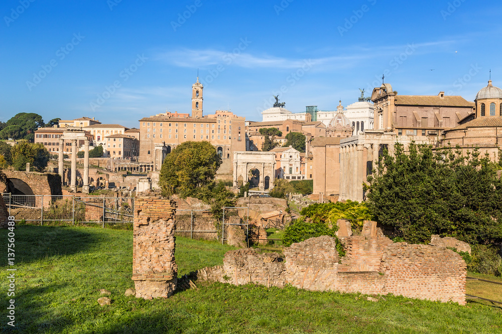 Rome, Italy. From left to right: Temple of Castor and Pollux, Temple of Saturn, Tabularium, Arch of Septimius Severus, Mamertinum, Curia Julia, Temple of Antoninus and Faustina, Temple of Romulus