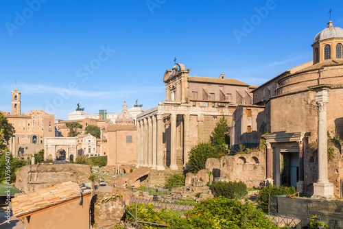 Rome, Italy. Roman Forum, from left to right: Tabularium (Senators Palace), Arch of Septimius Severus, Mamertinum, the Curia Julia, the Temple of Antoninus and Faustina, Temple of Romulus