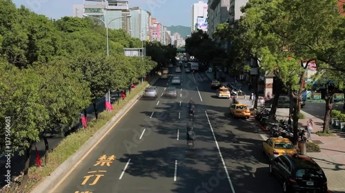 Major cities in Taiwan, capital Taipei, have to deal with a growing number of cars, motorbikes and other traffic on the road with the Taiwan Flag -Dan photo