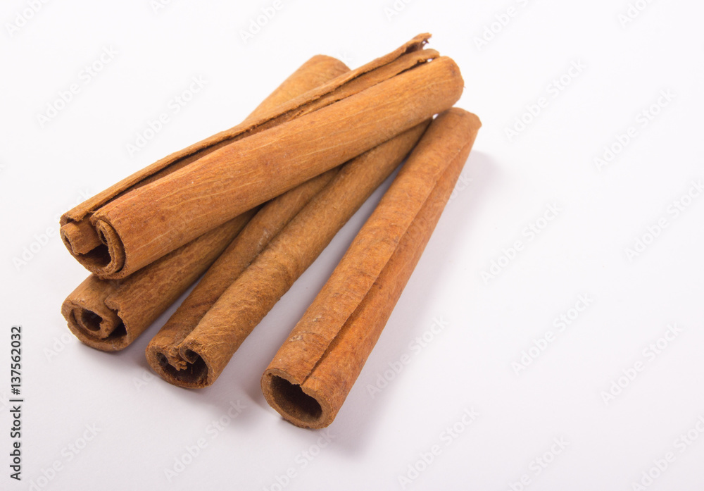 Cinnamon sticks isolated on white background. Cinnamon sticks isolated on white background.