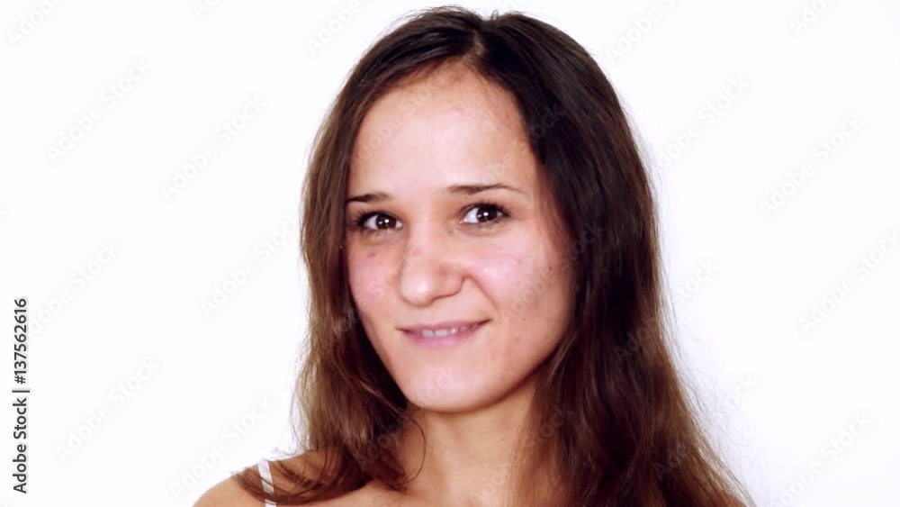 Closeup portrait of pretty brunette woman smiling isolated on white background. 3840x2160 Closeup portrait of pretty brunette woman smiling isolated on white background. 3840x2160