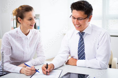 Wallpaper Mural Young businesspeople working with tablet Torontodigital.ca