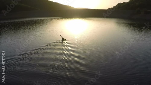 Padlling towards the morning sun