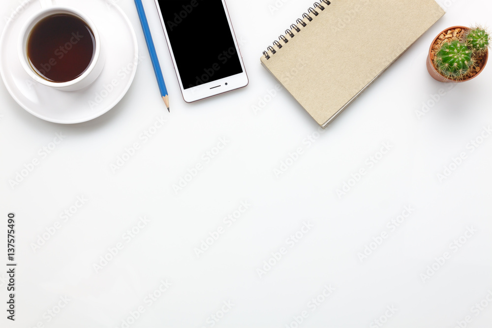 Top view accessories office desk concept.mobile phone,coffee,notepaper,pencil,cactus on office desk. Top view accessories office desk concept.mobile phone,coffee,notepaper,pencil,cactus on office desk.