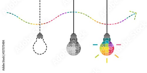 Thinking, perseverance and success concept with light bulb made of colorful puzzle pieces