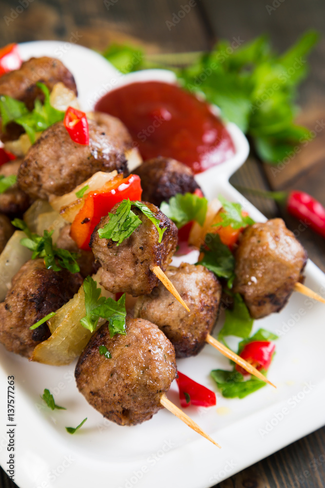 Kebab with meat balls and vegetables