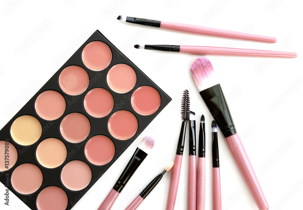 Lipstick palette with brush top view isolate on white. Lipstick palette with brush top view isolate on white.