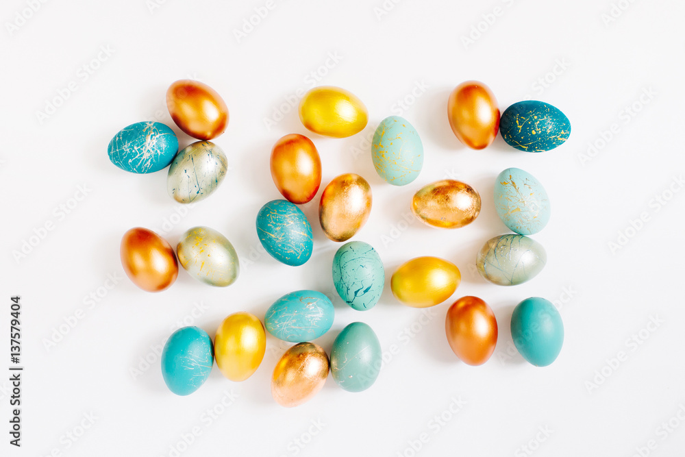 Background with blue, gold and turquoise speckled easter eggs. Ester concept Background with blue, gold and turquoise speckled easter eggs. Ester concept