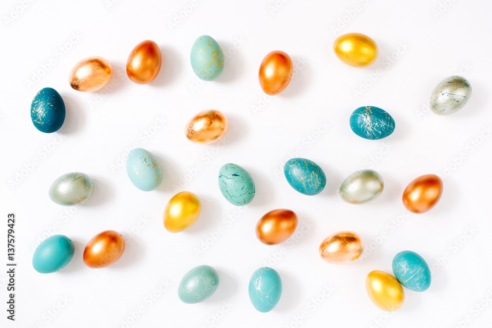 Pattern background with blue, gold and turquoise speckled easter eggs. Ester concept Pattern background with blue, gold and turquoise speckled easter eggs. Ester concept