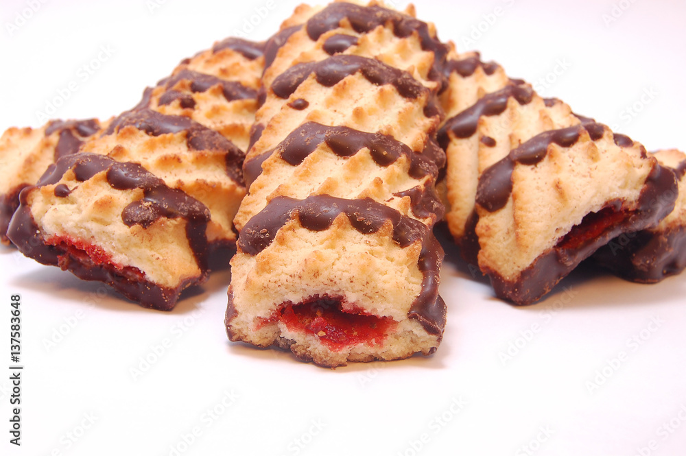 Pile of shortbread cookies with jam and chocolate icing Pile of shortbread cookies with jam and chocolate icing