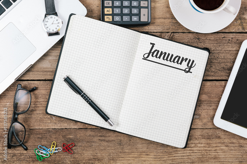 January on note book at office desktop