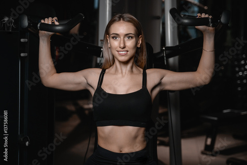 young sexy fitness woman train and exercising in gym healthy