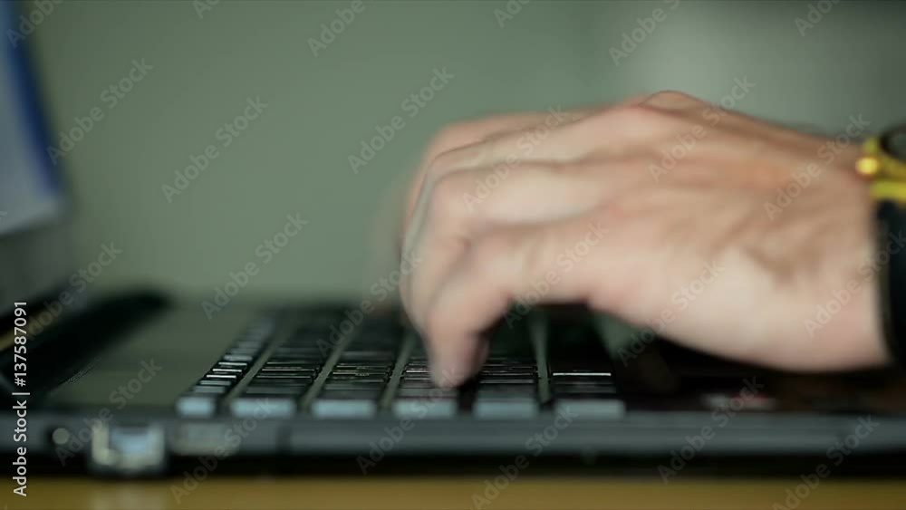 Close-Up of Male Hands Fast Typing on Keyboard Close-Up of Male Hands Fast Typing on Keyboard