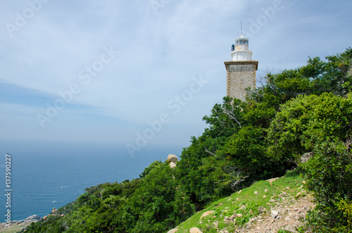 Mui Dinh lighthouse with beautiful view to sea, it is located on a hill of Ca Na, Ninh Thuan, Vietnam. © leekhoailang