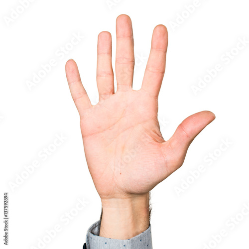Hand of man counting five