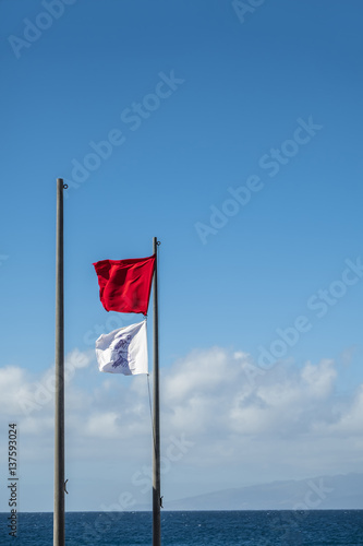 Red and white danger flags