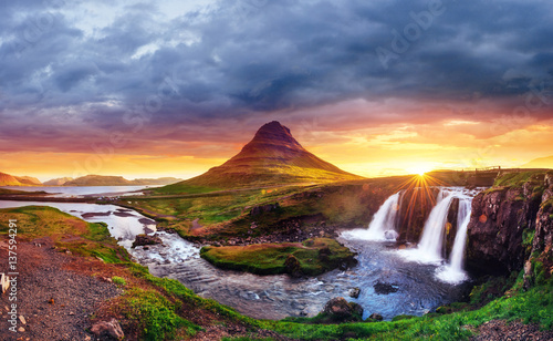 The picturesque sunset over landscapes and waterfalls. Kirkjufel © standret